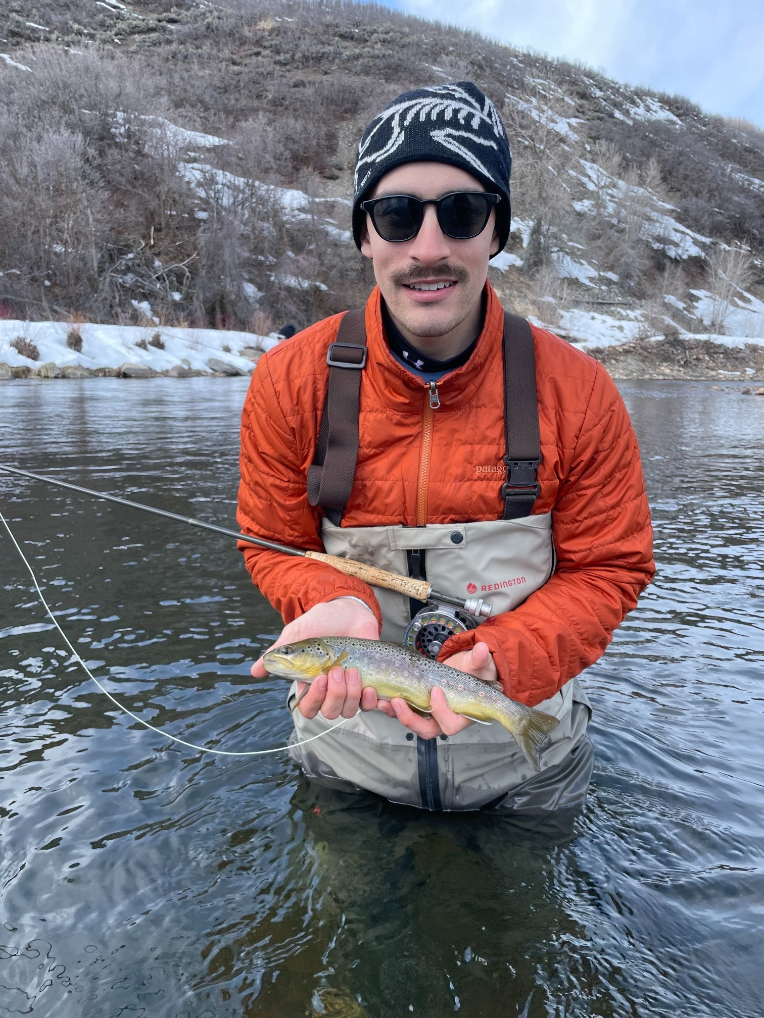 Michael fly fishing in a river